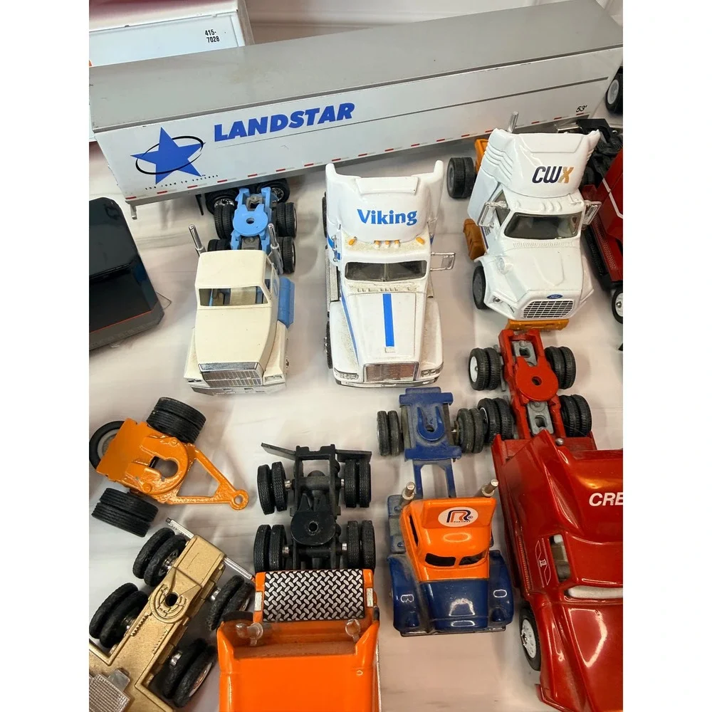 Mixed Semi Truck and Trailer Model Lot Roadway Viking CRST Repair Project